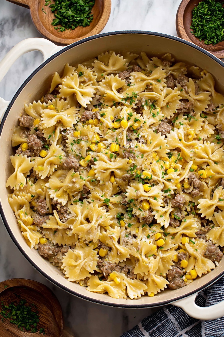 A white pot filled with a cooked pasta dish made of light yellow bow-tie pasta mixed evenly with small chunks of browned meat and bright yellow corn kernels. The pasta and meat are garnished with finely chopped green herbs scattered over the top. The pot sits on a white marbled surface with some green herbs in small wooden bowls placed nearby, adding a fresh touch to the scene. photo taken with an iphone --ar 2:3 --v 7